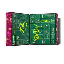The Kiehl’s Advent Calendar shown open, revealing 24 numbered compartments in green and gold, with playful neon yellow illustrations and festive accents across the interior panels.