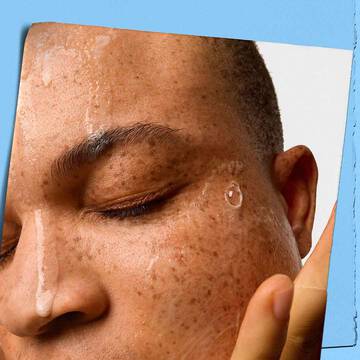 Kiehl’s Ultra Facial Cleanser being gently applied to the skin in a close-up shot.