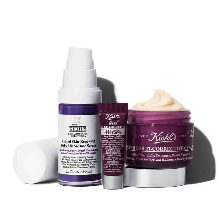 Kiehl's skincare products including a retinol serum, an eye treatment, and a multi-corrective cream.